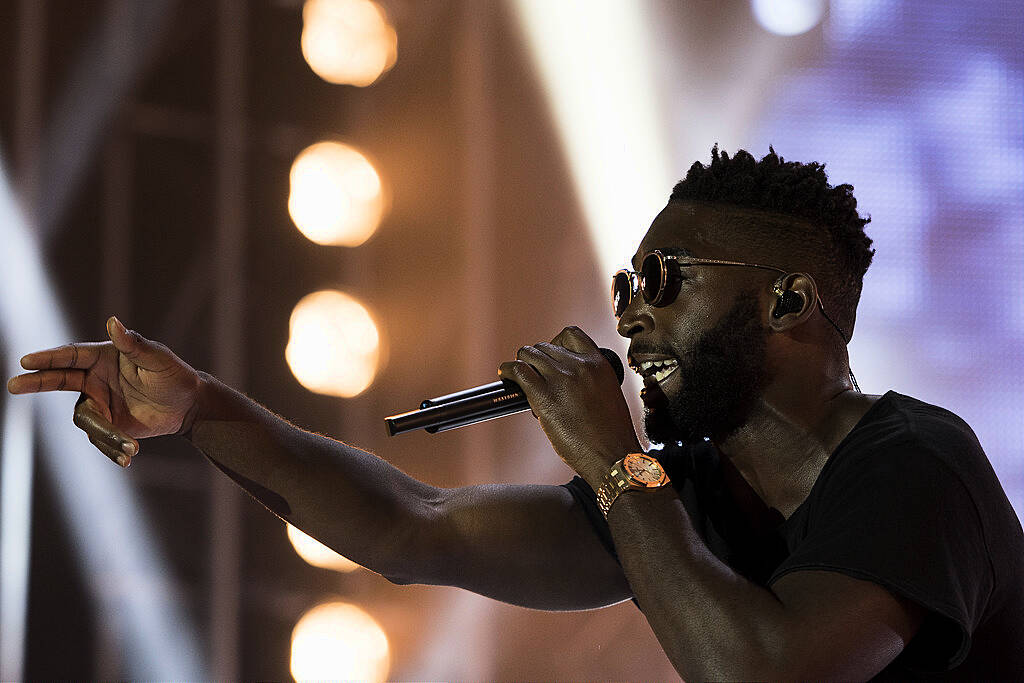 PLYMOUTH, ENGLAND - JULY 22:  Tinie Tempah performs on stage during the MTV Crashes Plymouth concert at Plymouth Hoe on July 22, 2014 in Plymouth, England.  (Photo by Matthew Horwood/Getty Images for MTV UK)