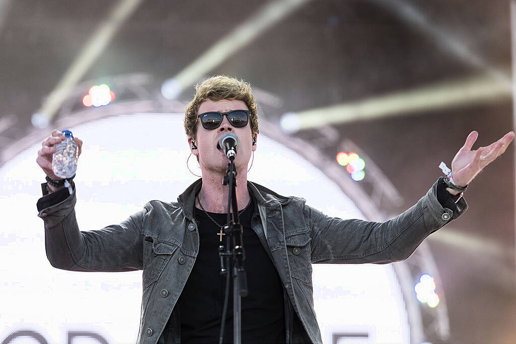 PLYMOUTH, ENGLAND - JULY 22:  Lead singer of Kodaline Steve Garrigan performs on stage during the MTV Crashes Plymouth concert at Plymouth Hoe on July 22, 2014 in Plymouth, England.  (Photo by Matthew Horwood/Getty Images for MTV UK)