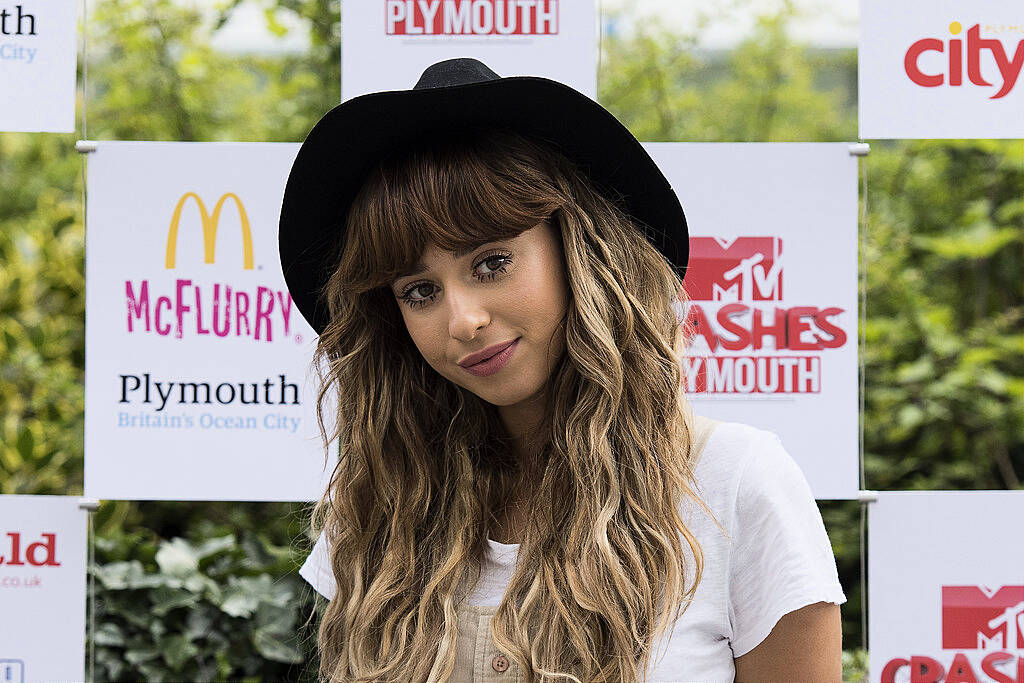 PLYMOUTH, ENGLAND - JULY 22:  Foxes (Louisa Rose Allen) poses for the media ahead of the MTV Crashes Plymouth concert at Plymouth Hoe on July 22, 2014 in Plymouth, England.  (Photo by Matthew Horwood/Getty Images for MTV UK)