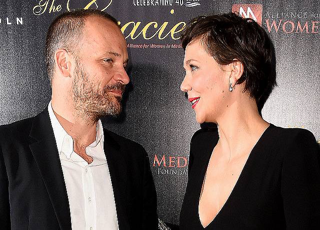 BEVERLY HILLS, CA - MAY 19:  Actors Peter Sarsgaard and  Maggie Gyllenhaal arrive at the 40th Anniversary Gracies Awards at The Beverly Hilton Hotel on May 19, 2015 in Beverly Hills, California.  (Photo by Frazer Harrison/Getty Images)