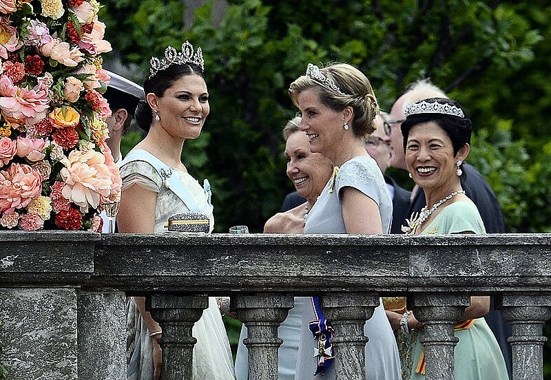 (LtoR) Sweden's Crown Princess Victoria, Britain's Sophie, Countess of Wessex, and Hisako Takamado of Japan are pictured after the wedding ceremony of Sweden's Crown Prince Carl Philip and Sofia Hellqvist at Stockholm Palace on June 13, 2015. AFP PHOTO / JONATHAN NACKSTRAND        (Photo credit should read JONATHAN NACKSTRAND/AFP/Getty Images)