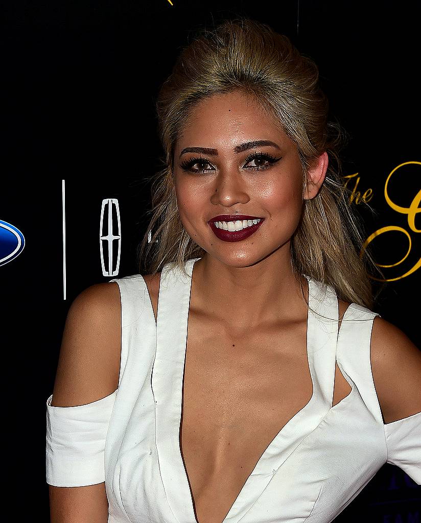 DJ Amy Pham poses on arrival for the 40th anniversary of the Gracies Awards in Beverly Hills, California on May 19, 2015, presented by The Alliance for Women in Media.   AFP PHOTO / FREDERIC J. BROWN        (Photo credit should read FREDERIC J. BROWN/AFP/Getty Images)