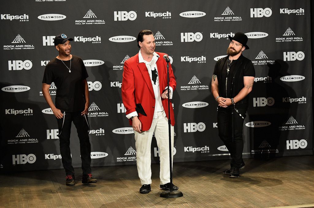 CLEVELAND, OH - APRIL 18:  Jason Ricci speaks in the press room as Tom Morello (L) and Zac Brown (R) look on during the 30th Annual Rock And Roll Hall Of Fame Induction Ceremony at Public Hall on April 18, 2015 in Cleveland, Ohio.  (Photo by Michael Loccisano/Getty Images)