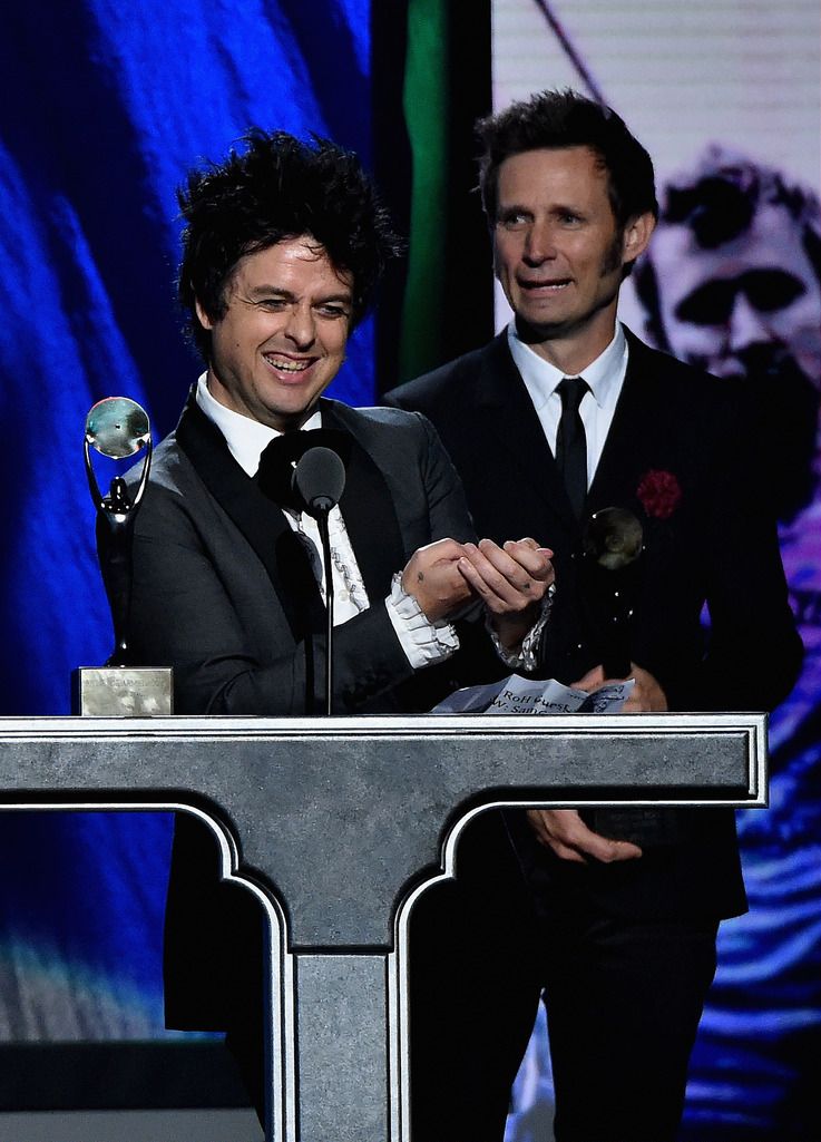 CLEVELAND, OH - APRIL 18:  Inductees Billie Joe Armstrong (L) and Mike Dirnt of Green Day speak onstage during the 30th Annual Rock And Roll Hall Of Fame Induction Ceremony at Public Hall on April 18, 2015 in Cleveland, Ohio.  (Photo by Mike Coppola/Getty Images)