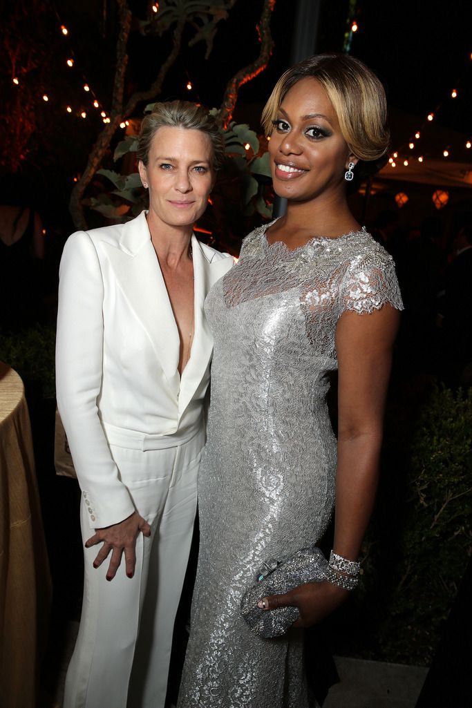 Robin Wright and Laverne Coxseen at the Netflix Celebration of the 66th Primetime Emmy Awards held at the Chateau Marmont on Monday, August 25, 2014, in Los Angeles. (Photo by Eric Charbonneau/Invision for Netflix]/AP Images)