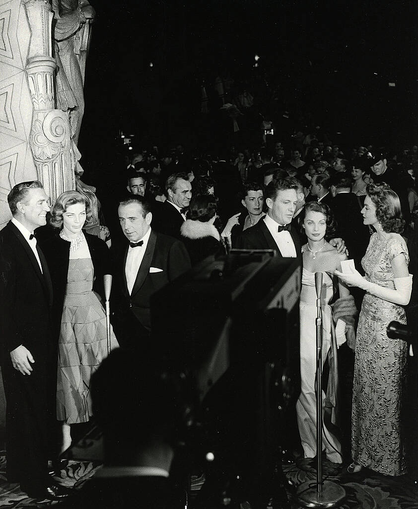 1955 Academy Awards
Shown in foreground from left: Robert Paige, Lauren Bacall, Humphrey Bogart, Robert Stack and wife Rosemarie Bowe, Unidentified


WENN.com