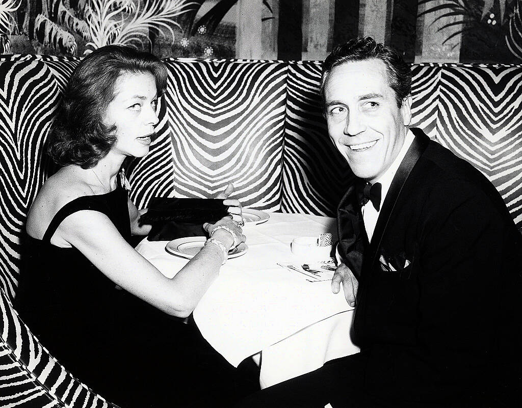 Shown from left: Lauren Bacall and Jason Robards at the El Morocco club (c. 1962)

WENN.com
