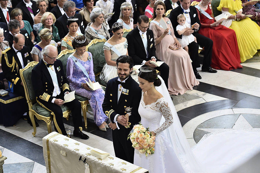 Sofia Hellqvist (R) and Sweden's Prince Carl Philip stand at the alter during their wedding ceremony at the Royal Chapel in Stockholm Palace on June 13, 2015. AFP PHOTO / TT NEWS AGENCY /  JONAS EKSTRÃ–MER  SWEDEN OUT        (Photo credit should read JONAS EKSTROMER/AFP/Getty Images)