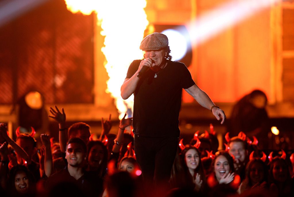 Singer Brian Johnson of AC/DC performs onstage during The 57th Annual GRAMMY Awards at the at the STAPLES Center on February 8, 2015 in Los Angeles, California.  (Photo by Kevork Djansezian/Getty Images)