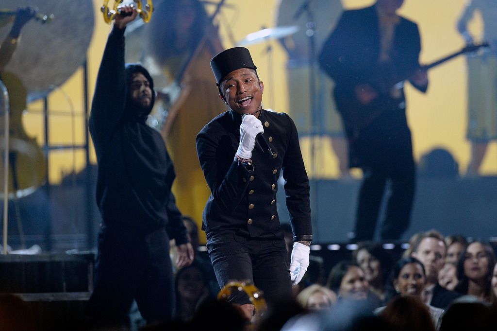 Singer Pharrell Williams performs "Happy" onstage during The 57th Annual GRAMMY Awards at the at the STAPLES Center on February 8, 2015 in Los Angeles, California.  (Photo by Kevork Djansezian/Getty Images)