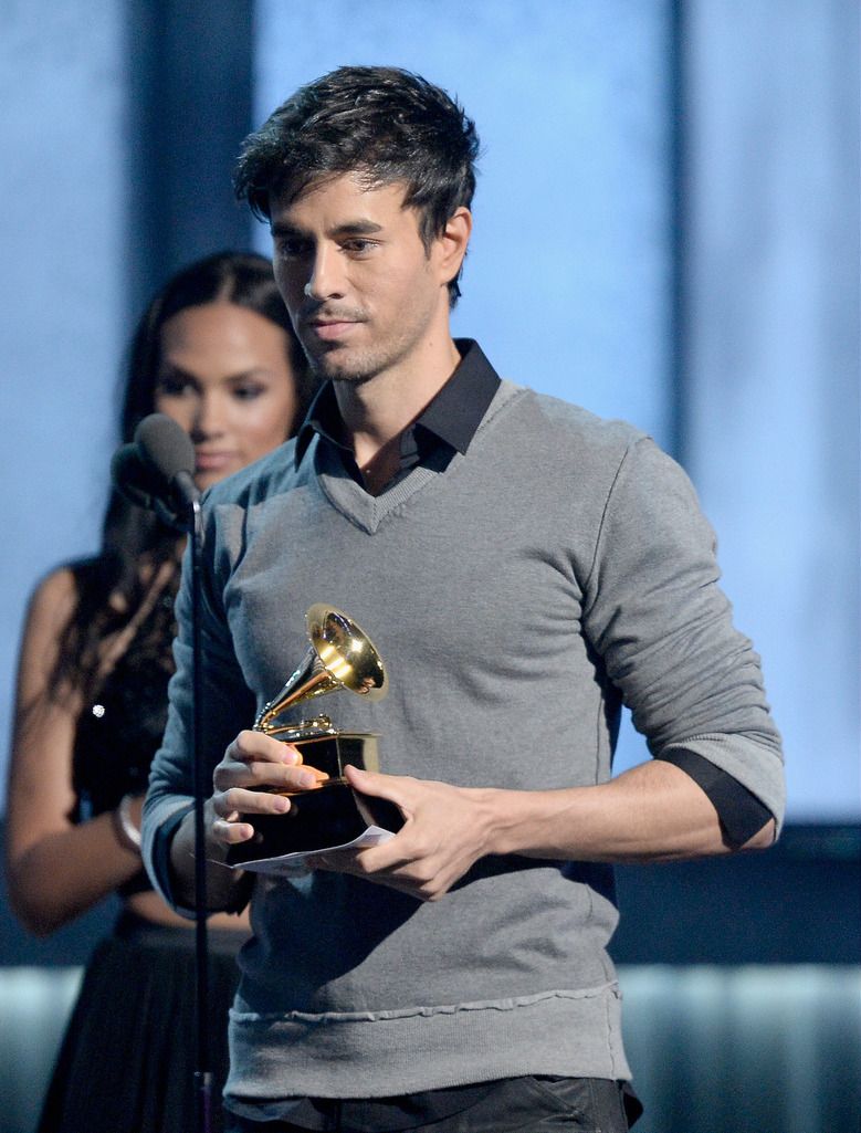 Singer Enrique Iglesias speaks onstage during The 57th Annual GRAMMY Awards at the at the STAPLES Center on February 8, 2015 in Los Angeles, California.  (Photo by Kevork Djansezian/Getty Images)