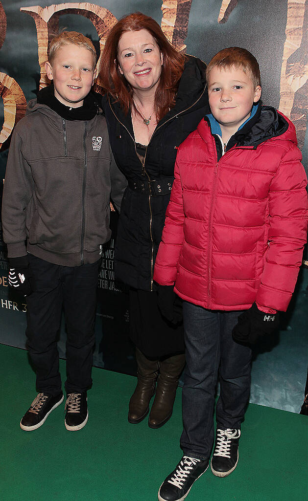 Blaithnaid Ni Chofaigh with sons Comhghal and Darach at The Irish Premiere screening of The Hobbit the battle  of the five armies at the Savoy Cinema Dublin.Pic:Brian McEvoy.