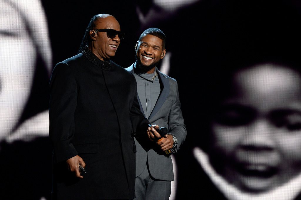 Singers Stevie Wonder (L) and Usher perform "If It's Magic" onstage during The 57th Annual GRAMMY Awards at the at the STAPLES Center on February 8, 2015 in Los Angeles, California.  (Photo by Kevork Djansezian/Getty Images)
