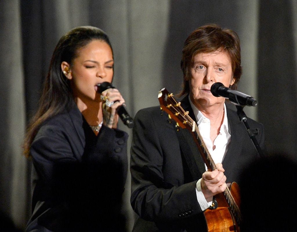 Singer Rihanna (L) and musician Paul McCartney perform onstage during The 57th Annual GRAMMY Awards at the at the STAPLES Center on February 8, 2015 in Los Angeles, California.  (Photo by Kevork Djansezian/Getty Images)