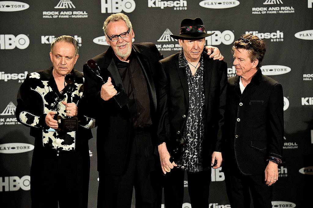 CLEVELAND, OH - APRIL 18:  Jimmie Vaughan and inductees Reese Wynans, Tommy Shannon and Chris Layton of Stevie Ray Vaughan and Double Trouble speak in the press room during the 30th Annual Rock And Roll Hall Of Fame Induction Ceremony at Public Hall on April 18, 2015 in Cleveland, Ohio.  (Photo by Michael Loccisano/Getty Images)