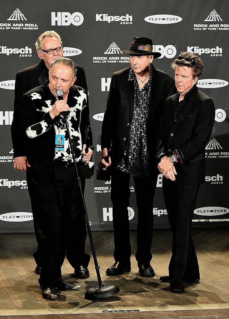 CLEVELAND, OH - APRIL 18:  Jimmie Vaughan and inductees Reese Wynans, Tommy Shannon and Chris Layton of Stevie Ray Vaughan and Double Trouble speak in the press room during the 30th Annual Rock And Roll Hall Of Fame Induction Ceremony at Public Hall on April 18, 2015 in Cleveland, Ohio.  (Photo by Michael Loccisano/Getty Images)