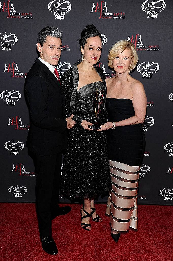 NEW YORK, NY - APRIL 27:  AAFA Statuette Designers Ruben Toledo (L) and Isabel Toledo (C) pose with AAFA President & CEO Juanita D. Duggan during the 2015 AAFA American Image Awards on April 27, 2015 in New York City.  (Photo by Andrew Toth/Getty Images for American Image Awards)