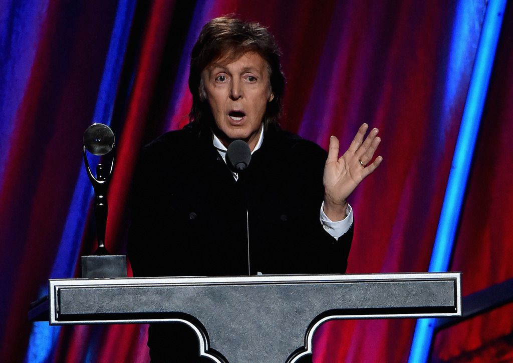 CLEVELAND, OH - APRIL 18:  Sir Paul McCartney inducts Ringo Starr onstage during the 30th Annual Rock And Roll Hall Of Fame Induction Ceremony at Public Hall on April 18, 2015 in Cleveland, Ohio.  (Photo by Mike Coppola/Getty Images)