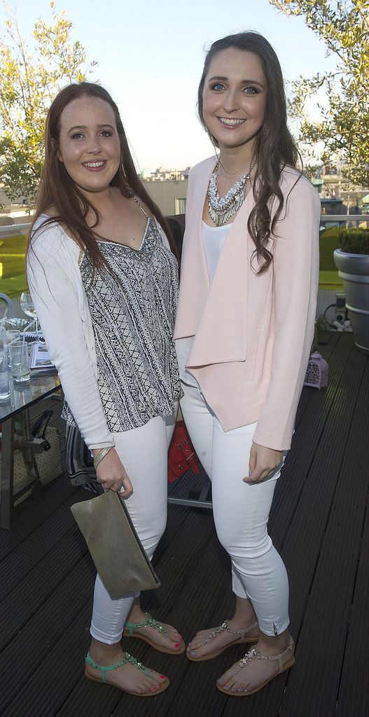 Julia Shaw and Grace O'Kelly pictured at faux-glow expert  KARORA's #TANchella rooftop party at the Morgan hotel. KARORA's new Ultra Dark Mousse was unveiled on the night, a tan with true staying power that fades incredibly evenly, perfect for the summerâ€™s festival season. Pic Patrick O'Leary 