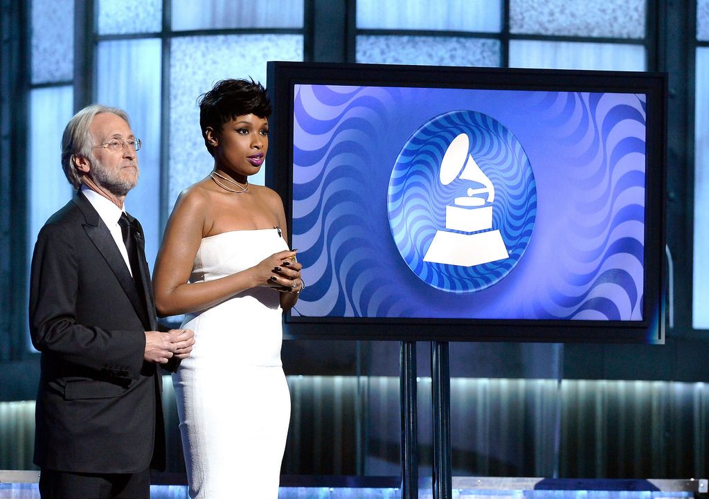 President of the National Academy of Recording Arts and Sciences, Neil Portnow and recording artists Jennifer Hudson speak onstage during The 57th Annual GRAMMY Awards at the at the STAPLES Center on February 8, 2015 in Los Angeles, California.  (Photo by Kevork Djansezian/Getty Images)