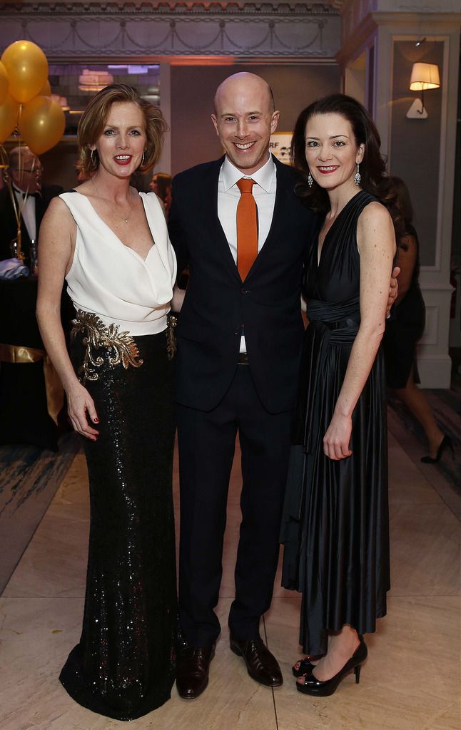 
Sonia Reynolds with Eoin Lyons and Aoife Lyons, pictured at the CMRF Crumlin Gold Ball at the Doubletree by Hilton Hotel on Saturday March 14th.CMRF Crumlin, the principal fundraising body for Our Ladyâ€™s Childrenâ€™s Hospital, Crumlin and the National Childrenâ€™s Research Centre, celebrated its 50th anniversary with The Gold Ball to acknowledge 50 years of fundraising for childrenâ€™s health in Ireland. Pic. Robbie Reynolds