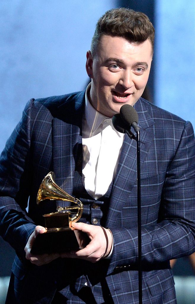 Singer Sam Smith accepts the Song of the Year award for "Stay With Me" onstage during The 57th Annual GRAMMY Awards at the at the STAPLES Center on February 8, 2015 in Los Angeles, California.  (Photo by Kevork Djansezian/Getty Images)