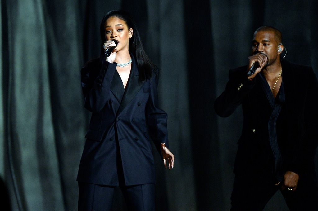 Recording artists Rihanna (L) and Kanye West perform "FourFiveSeconds" onstage during The 57th Annual GRAMMY Awards at the at the STAPLES Center on February 8, 2015 in Los Angeles, California.  (Photo by Kevork Djansezian/Getty Images)