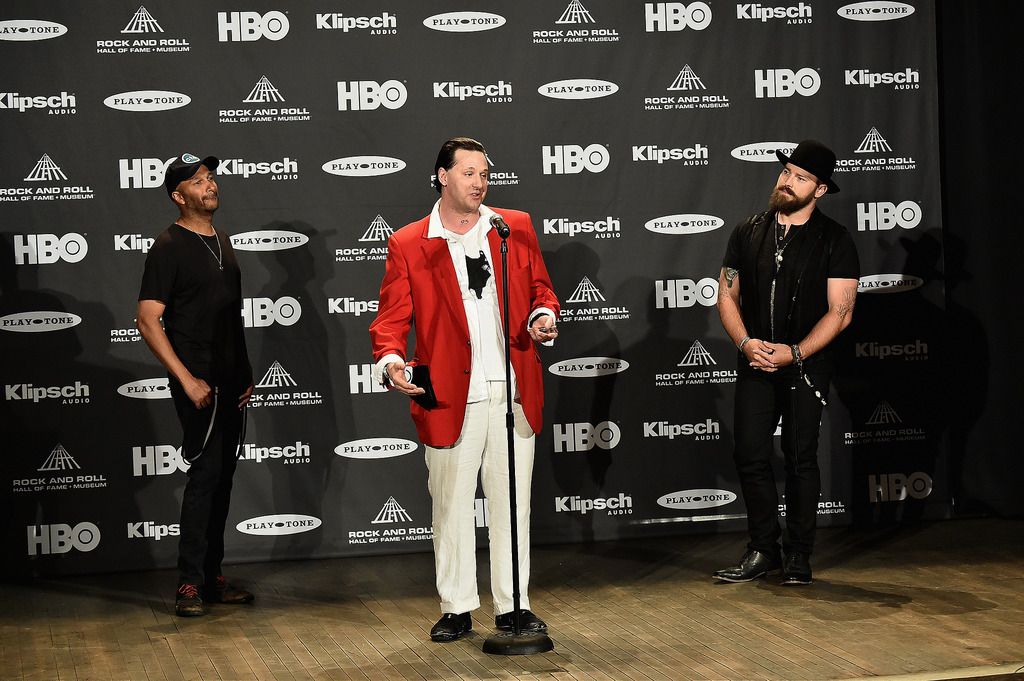 CLEVELAND, OH - APRIL 18:  Jason Ricci speaks in the press room as Tom Morello (L) and Zac Brown (R) look on during the 30th Annual Rock And Roll Hall Of Fame Induction Ceremony at Public Hall on April 18, 2015 in Cleveland, Ohio.  (Photo by Michael Loccisano/Getty Images)