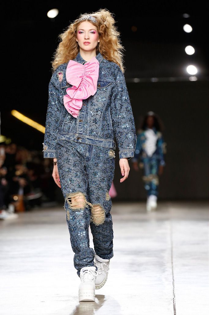 LONDON, ENGLAND - FEBRUARY 17:  A model walks the runway at the Ashish show at London Fashion Week AW14 at Tate Modern on February 17, 2014 in London, England.  (Photo by Tristan Fewings/Getty Images)