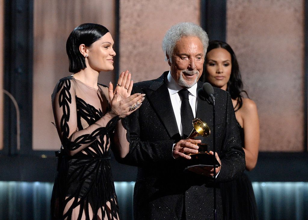  Singers Jessie J (L) and Tom Jones speak onstage during The 57th Annual GRAMMY Awards at the at the STAPLES Center on February 8, 2015 in Los Angeles, California.  (Photo by Kevork Djansezian/Getty Images)