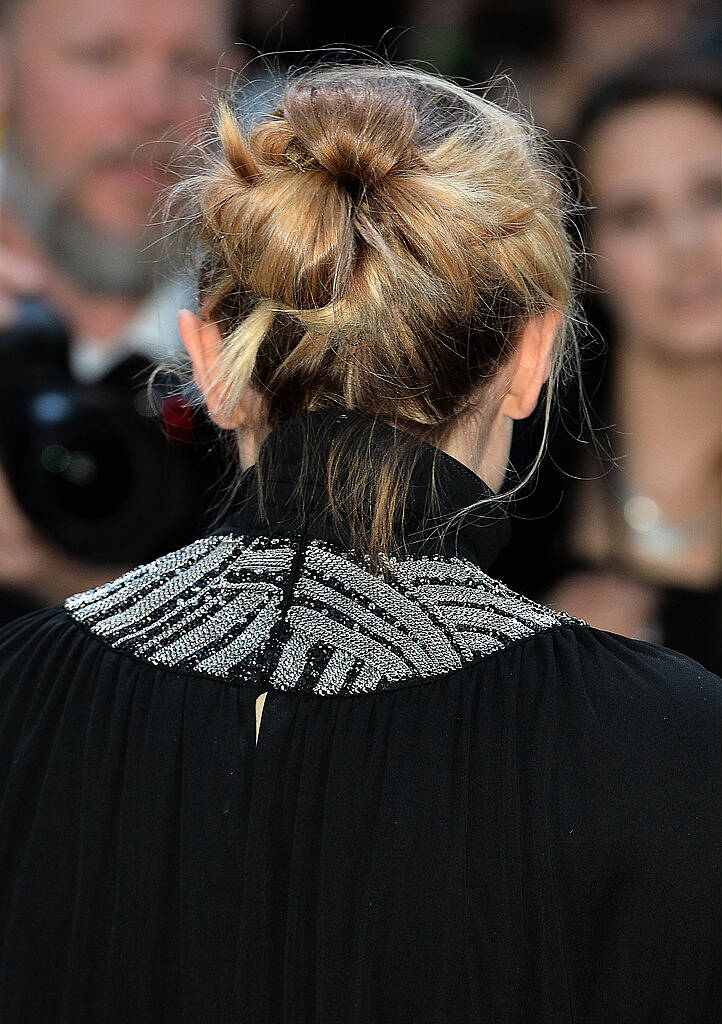 LONDON, ENGLAND - APRIL 21:  Elizabeth Olsen, hair  detail, attends "The Avengers: Age Of Ultron" European premiere at Westfield London on April 21, 2015 in London, England.  (Photo by Anthony Harvey/Getty Images)