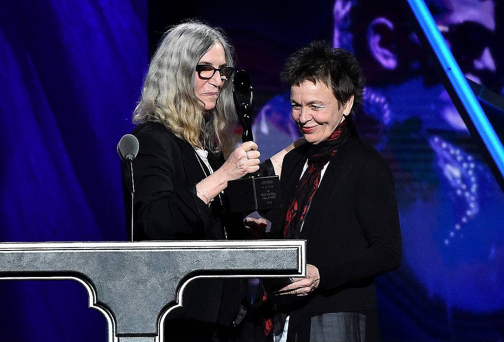 CLEVELAND, OH - APRIL 18:  Musician Patti Smith speaks with Laurie Anderson speaking on behalf of inductee Lou Reed during the 30th Annual Rock And Roll Hall Of Fame Induction Ceremony at Public Hall on April 18, 2015 in Cleveland, Ohio.  (Photo by Mike Coppola/Getty Images)