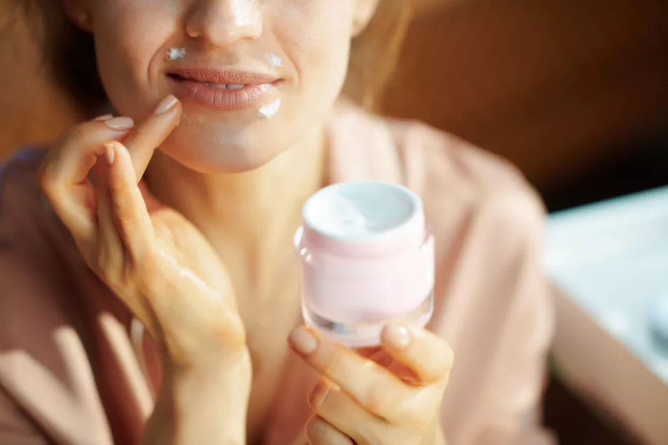 woman moisturising