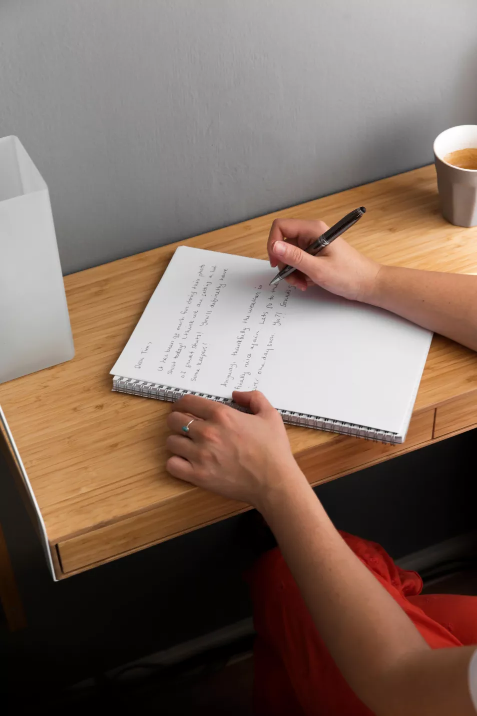 Person writing in a journal