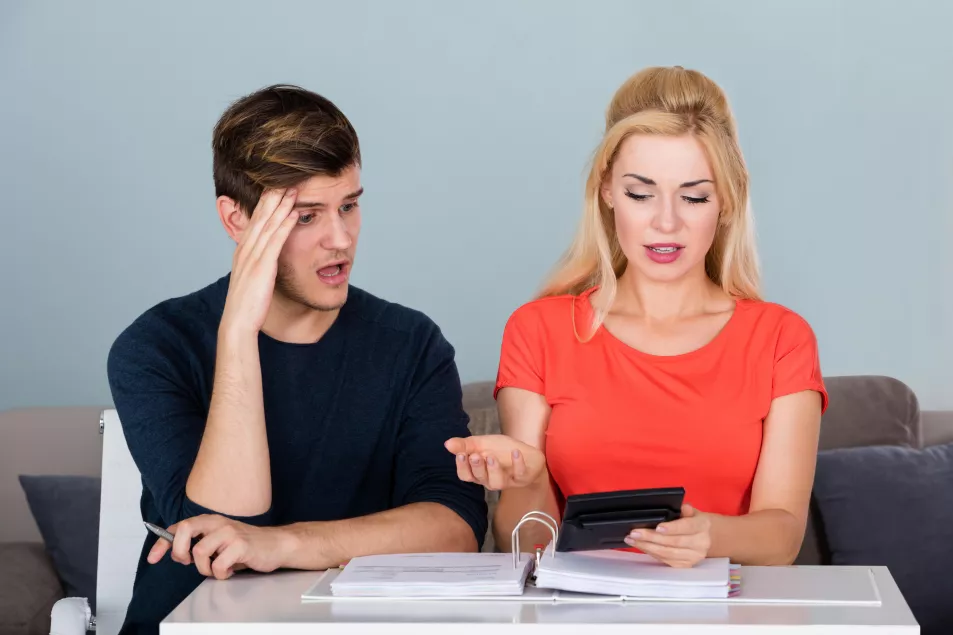 A couple looking at finances (Alamy/PA)