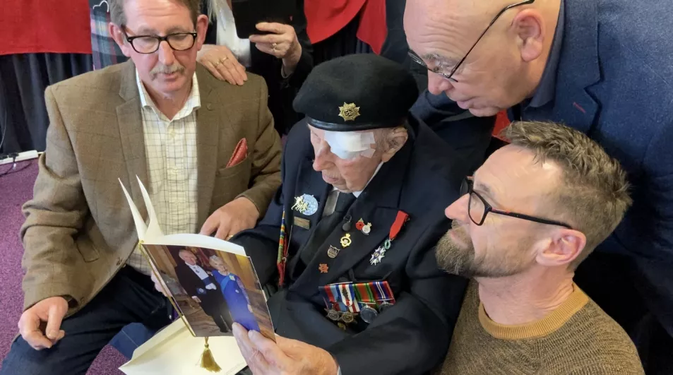 Ken Hobb's sons read his 100th birthday message from King Charles