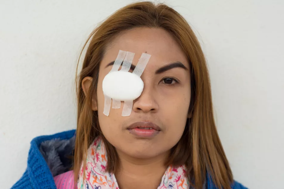 woman with eye patch