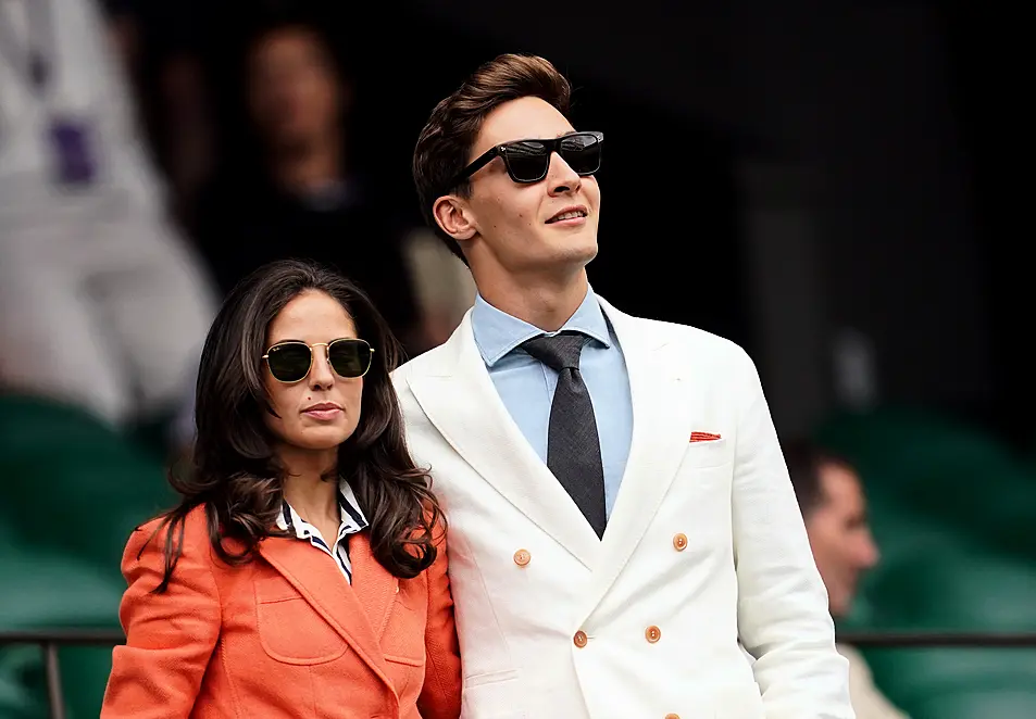 Mercedes F1 driver George Russell, alongside Carmen Montero Mundt in the royal box on day ten of the 2023 Wimbledon Championships 