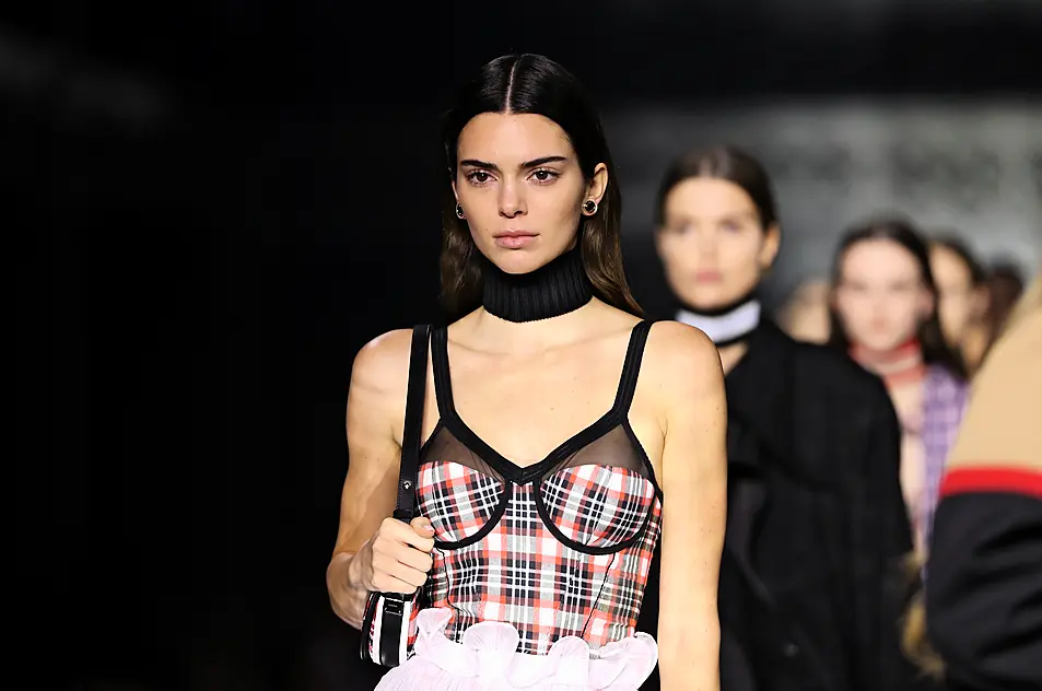 Kendall Jenner walking the runway for Burberry