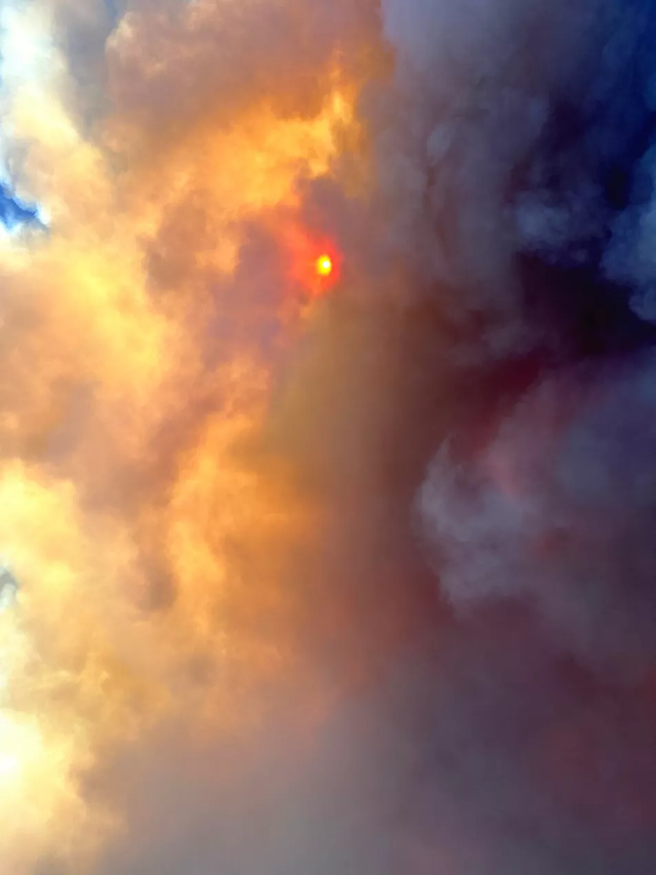 A large cloud of smoke covering the sun on Rhodes