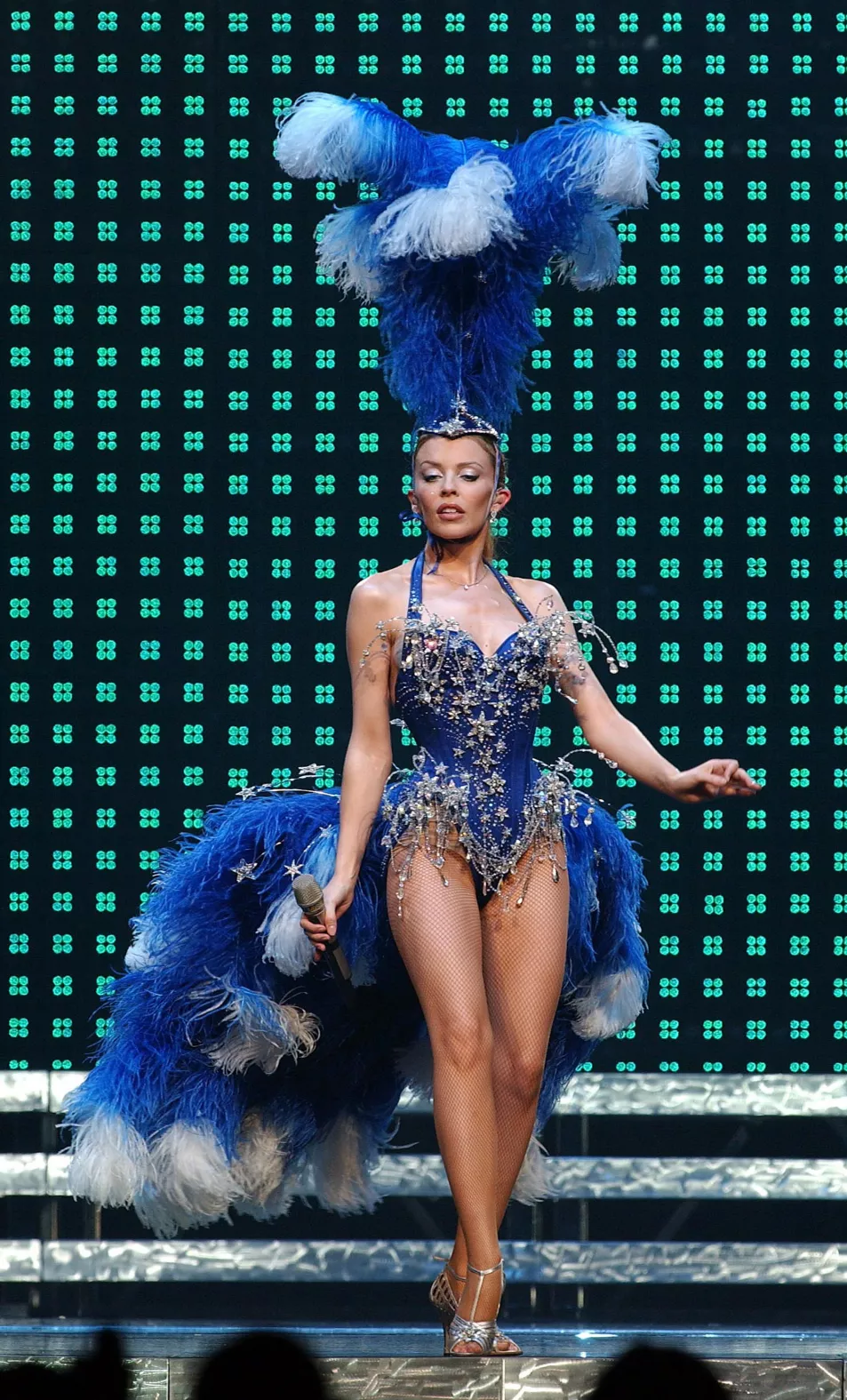 Kylie Minogue performing on stage during her Showgirl tour in 2005
