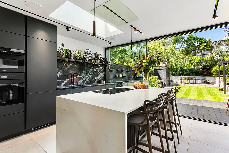 Modern kitchen with layered lighting