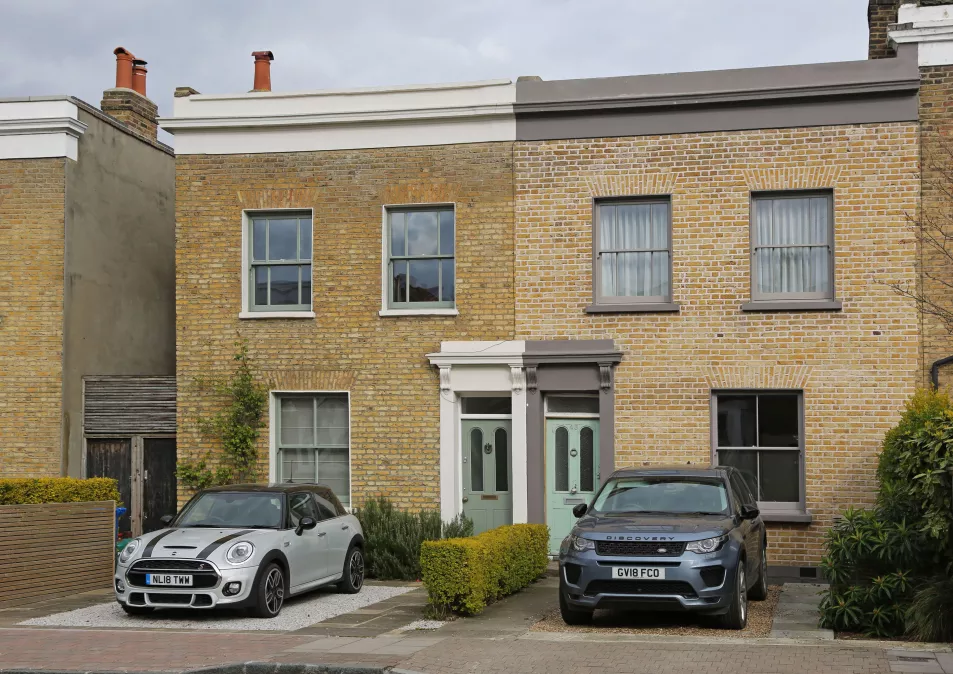 Victorian houses that have converted front garden into car parking spaces