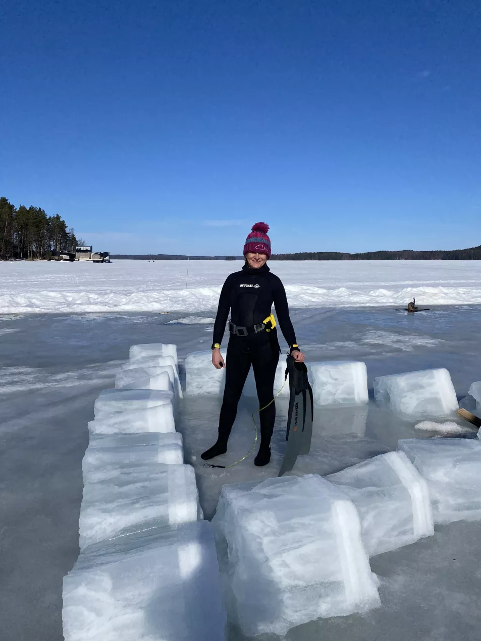 TV presenter Louise Minchin free-diving under ice in Finland (Bloomsbury Sport/PA)