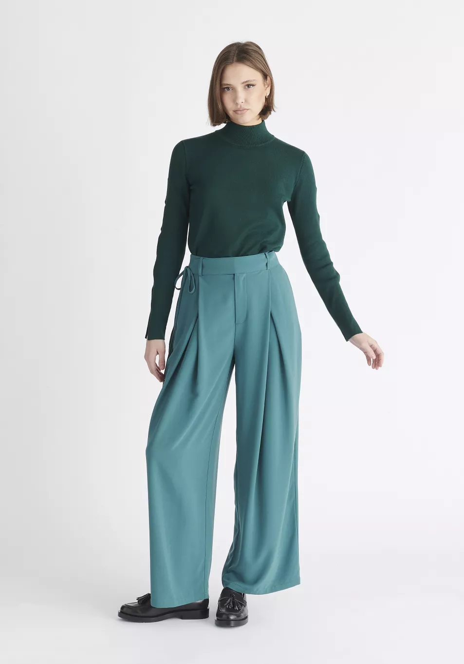 Paisie Teal Pleated High Waist Trousers; Dark Green Knitted Cut Out Sleeve Top