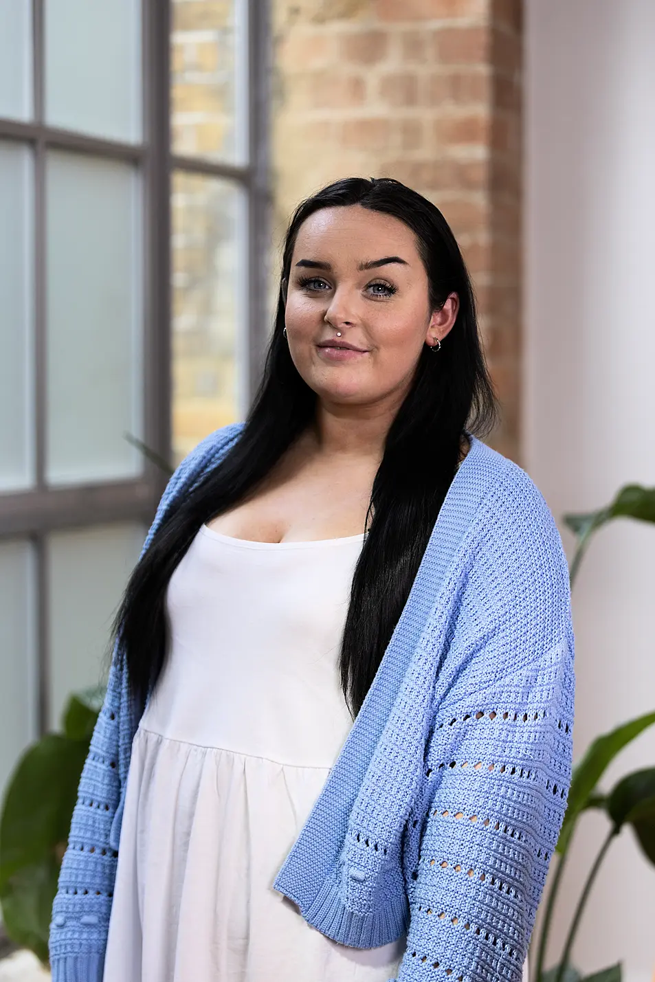 Shauna Kaleta in a blue cardigan