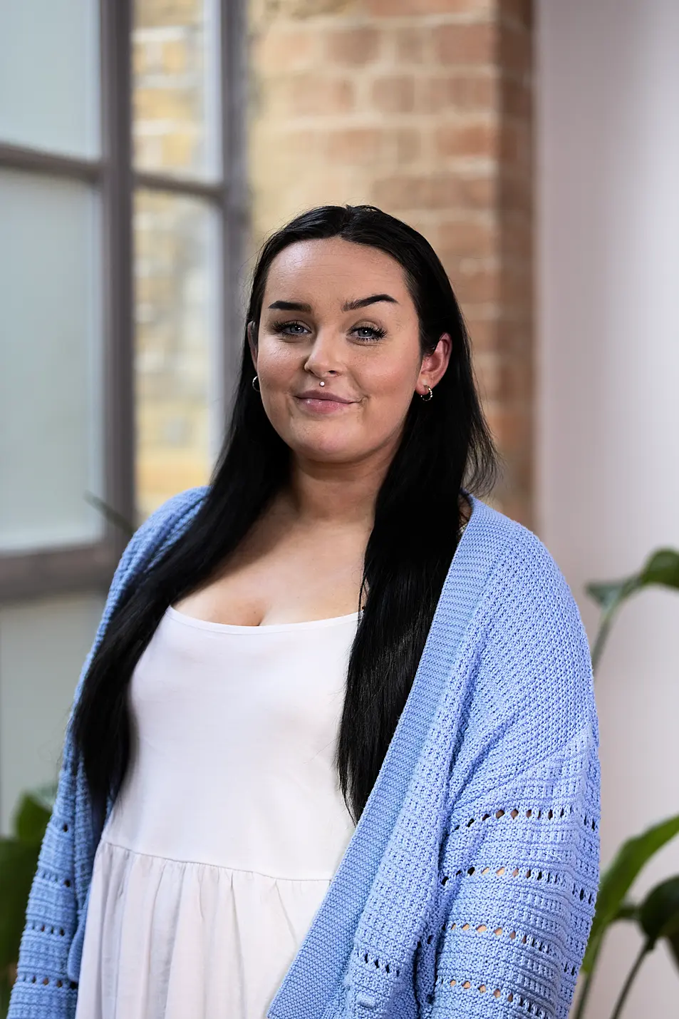 Shauna Kaleta in a blue cardigan