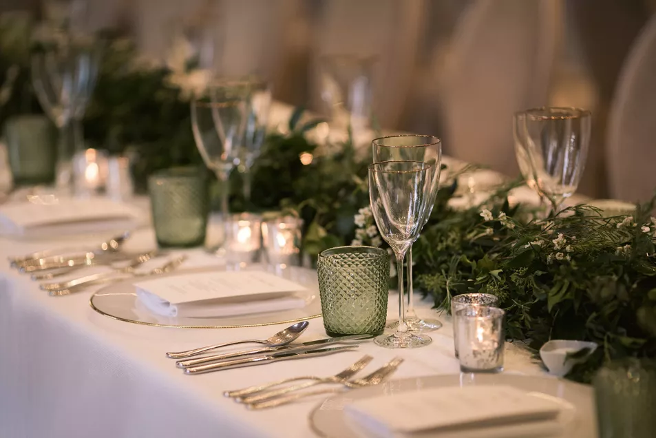 Wedding table with foliage and candles