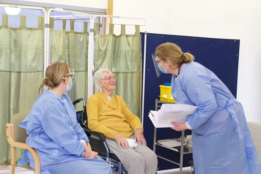 Maura Byrne receives the vaccine