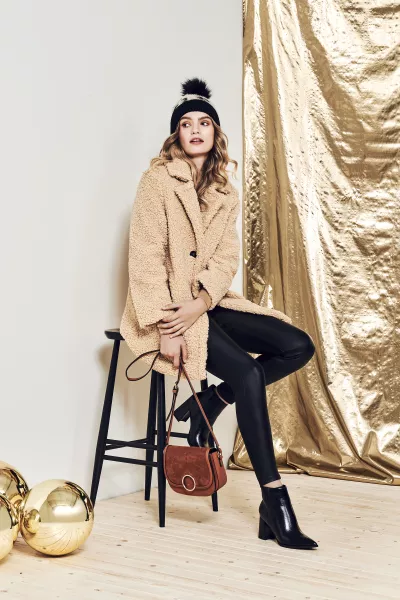 Dorothy Perkins Long Teddy Coat in Tan, £47.99 (was £59.99); Coated Frankie Jeans in Black, £26; Ring Saddle Cross Body Bag in Tan, £10 (was £20); Analisa Point Boots in Black, £21 (were £35); hat out of stock